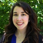 Portrait of Erin Dunne, Training & Outreach Coordinator New England PTTC, smiling in professional attire.